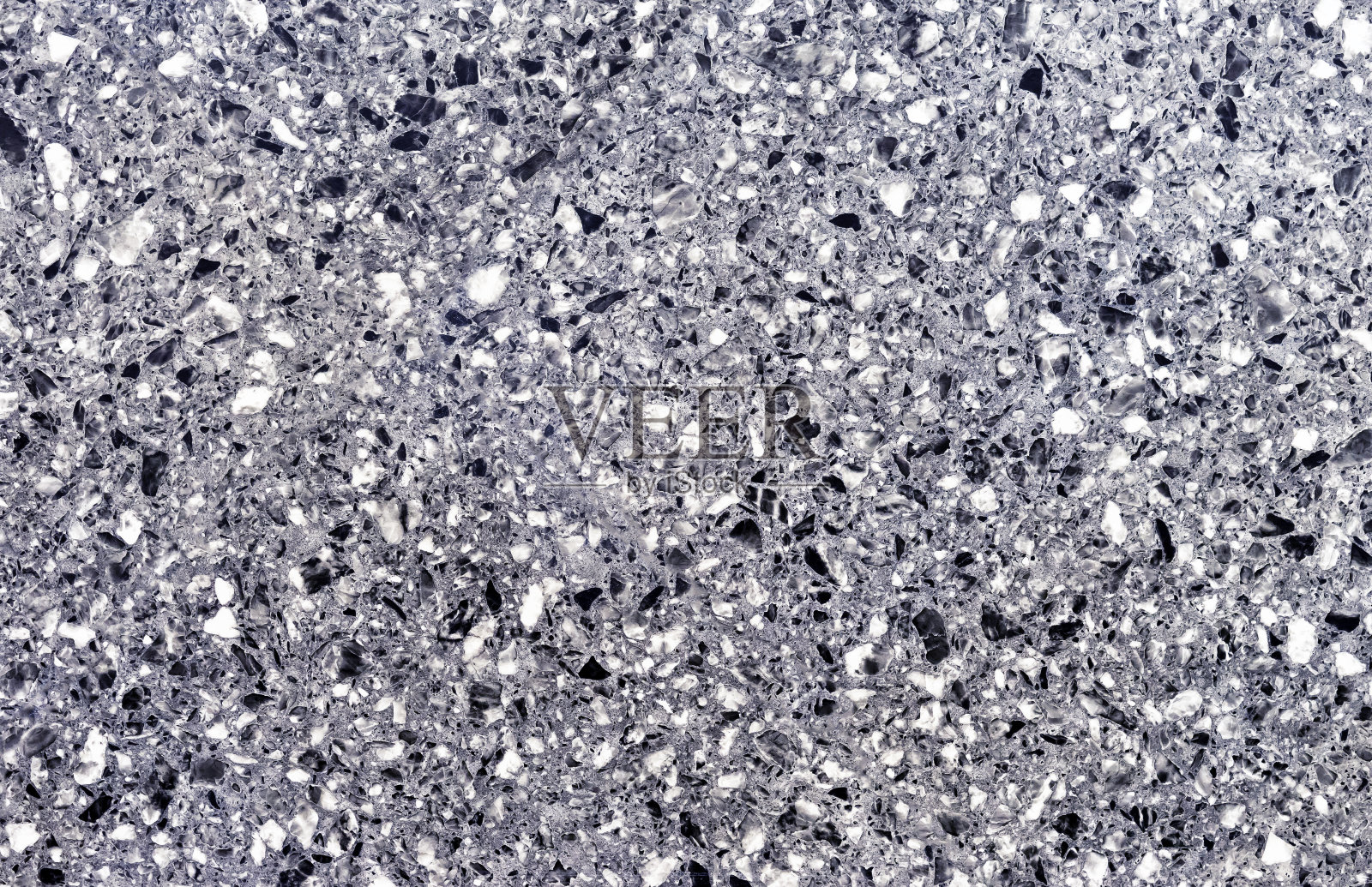 灰色花岗岩的背景。花岗岩的纹理。照片摄影图片