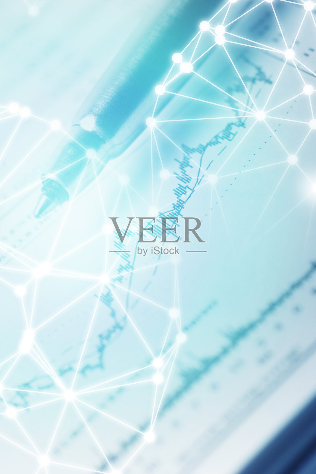 股票市场数据图上的圆珠笔照片摄影图片