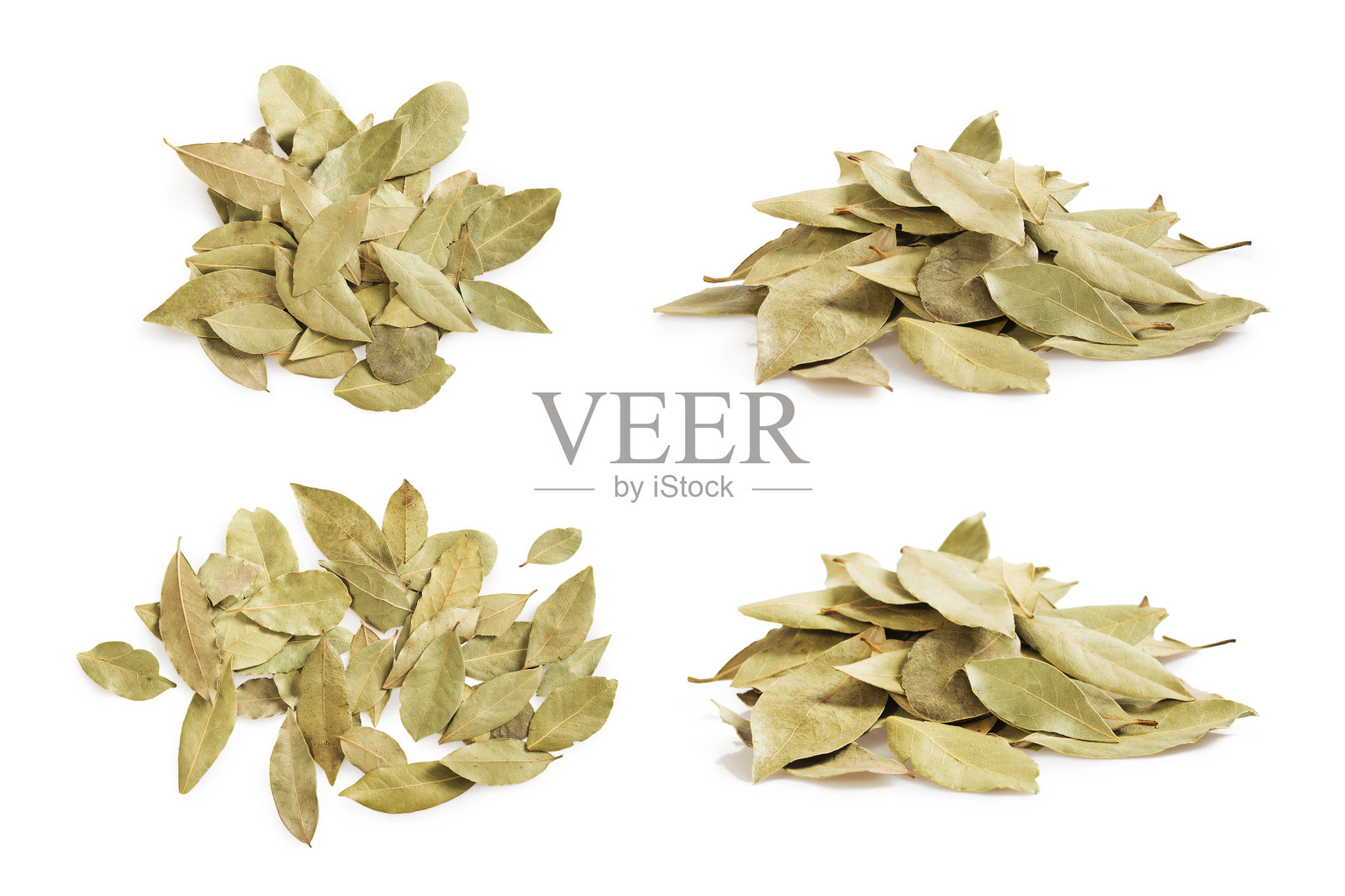 一套干月桂叶堆和纹理孤立在白色。照片摄影图片