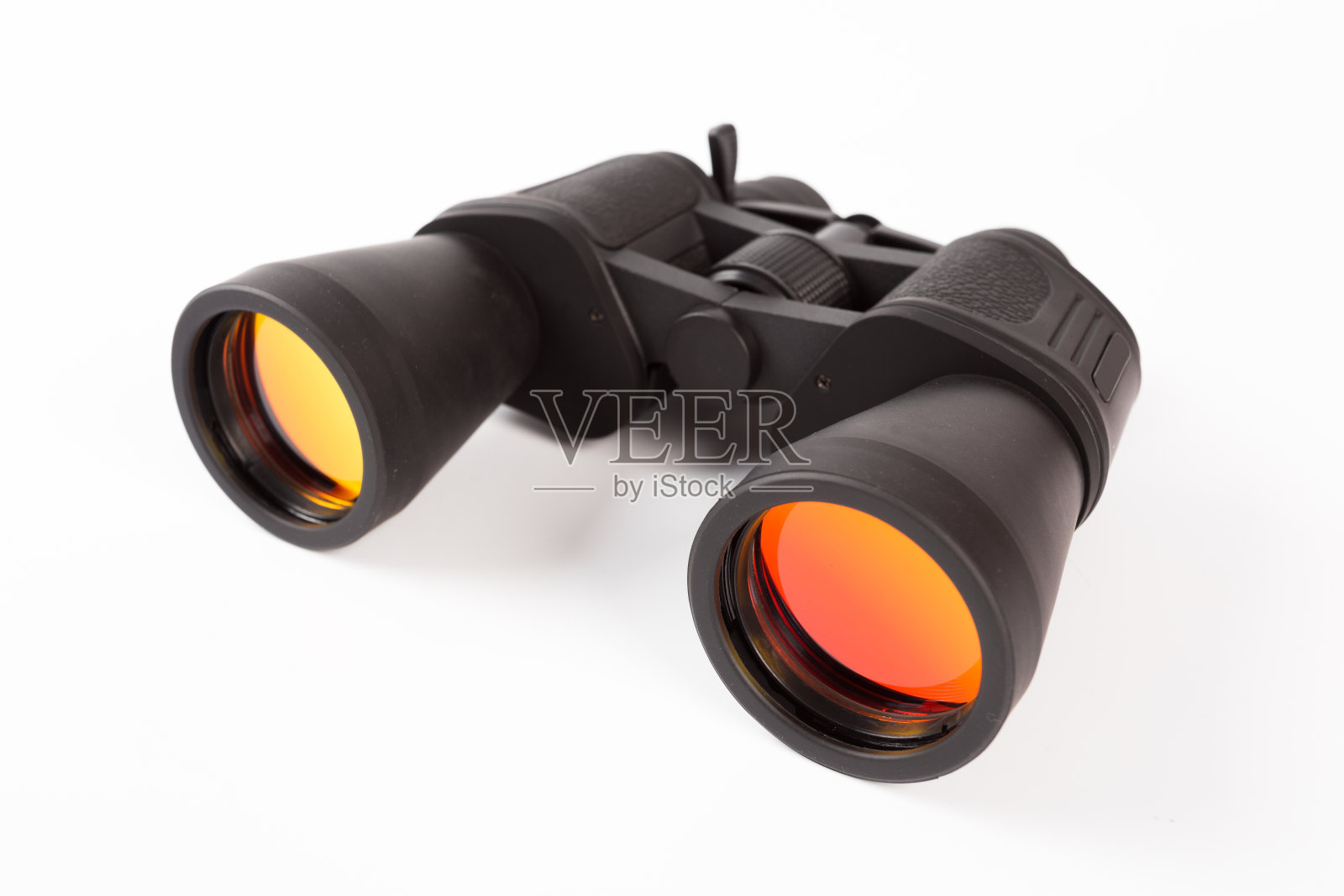 黑色双筒望远镜与橙色透镜隔离在白色背景照片摄影图片