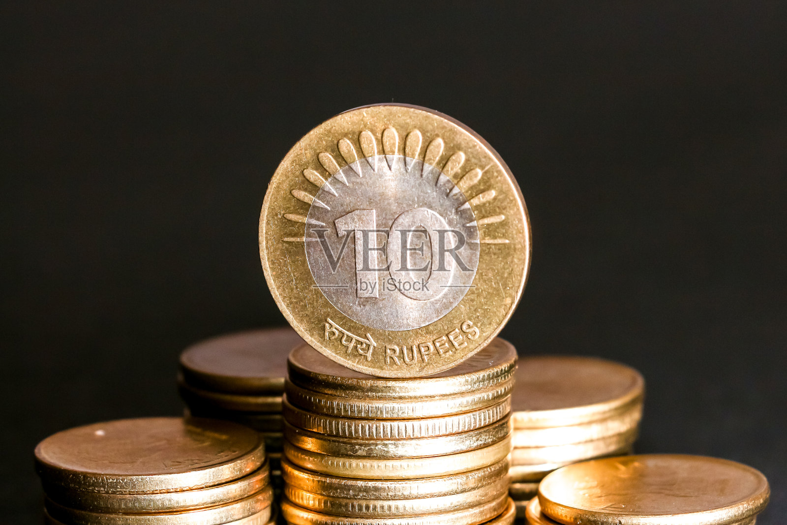 新印度的硬币。照片摄影图片