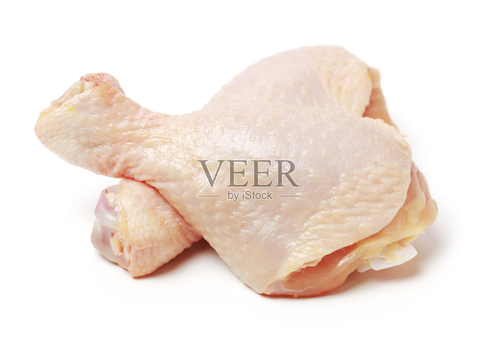 白色背景上的鸡腿照片摄影图片