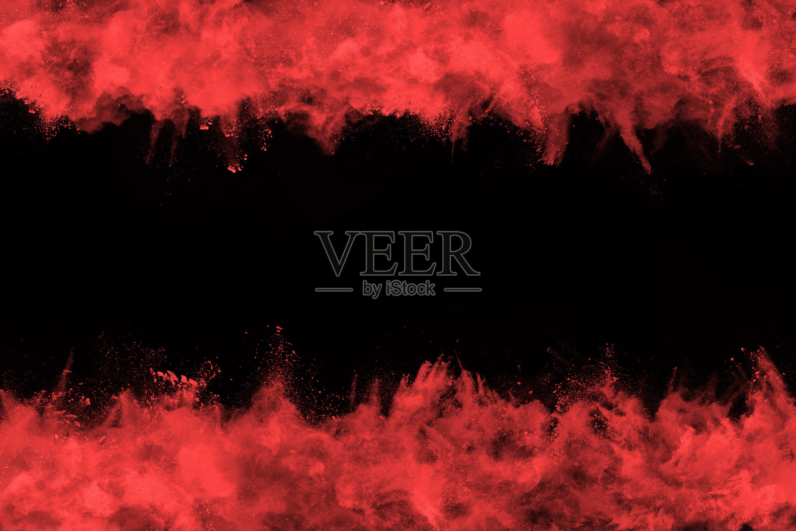 摘要红色粉末在黑色背景上爆炸。抽象的红色粉末溅在黑色背景上。冻结运动的红色粉末爆炸。照片摄影图片