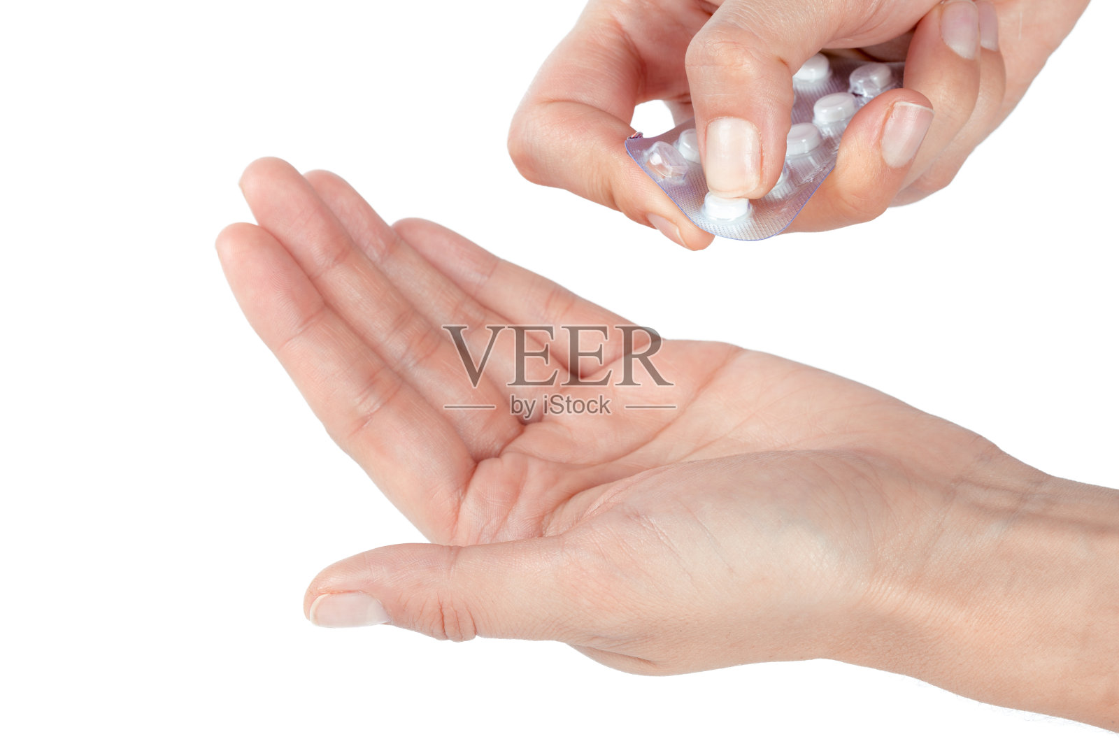 女人手里的药丸照片摄影图片