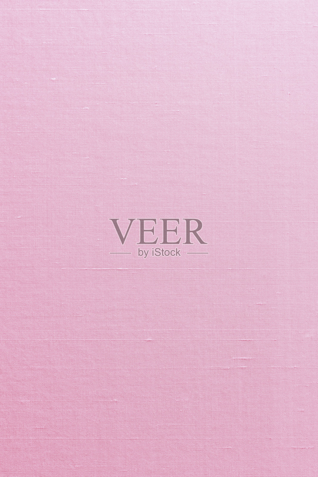 丝绸、棉麻混纺织物,织物有纹理的背景,颜色浅甜的红粉色照片摄影图片