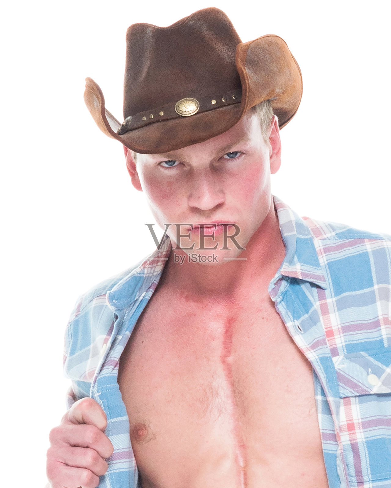 性感牛仔,衬衫敞开,拿着套索照片摄影图片