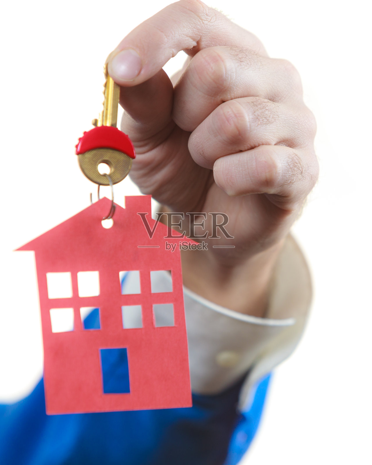 男人手里拿着家里的钥匙照片摄影图片