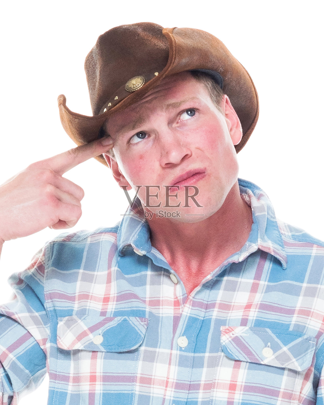 英俊的牛仔在想照片摄影图片