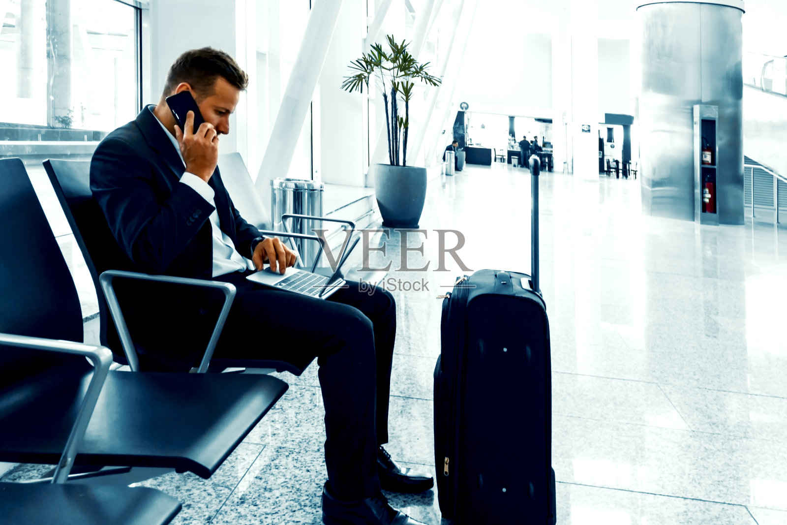 机场的商人。照片摄影图片