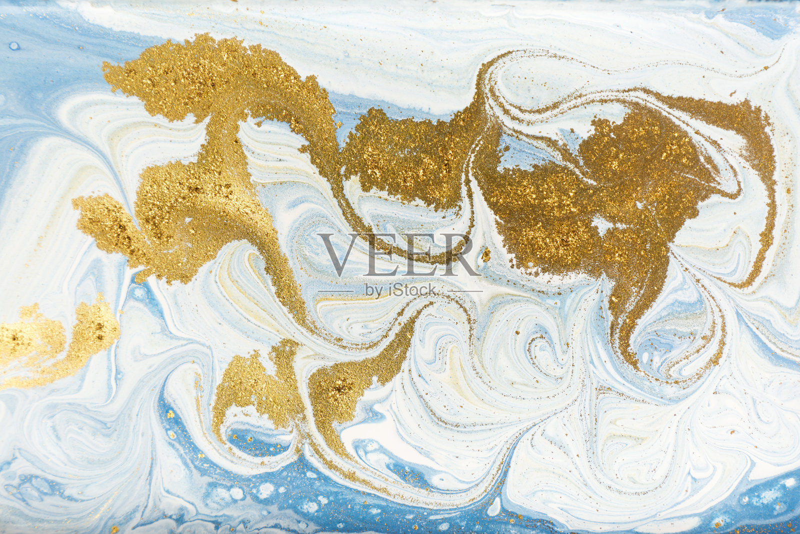 白色、蓝色和金色的大理石花纹。金色大理石液体纹理。照片摄影图片