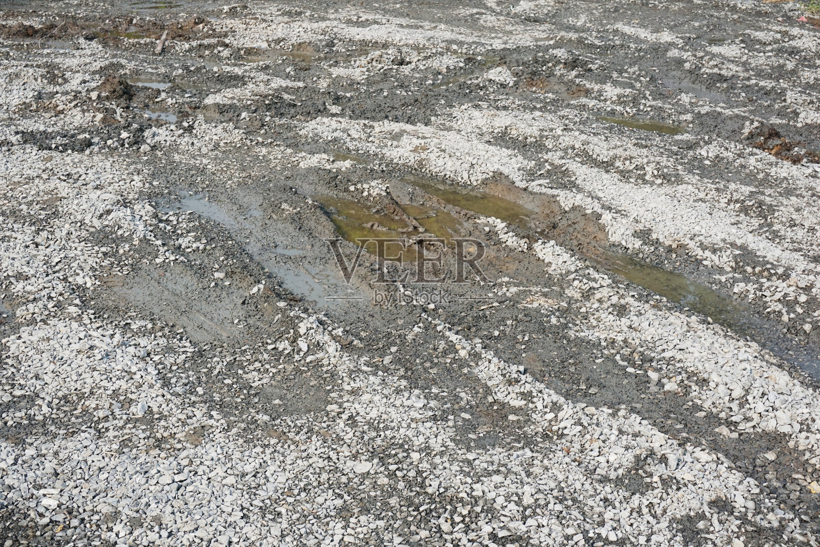 石材地板上干燥的车轮轨迹纹理照片摄影图片