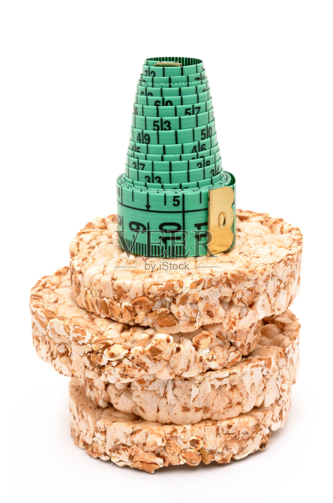 用卷尺测量脆饼照片摄影图片