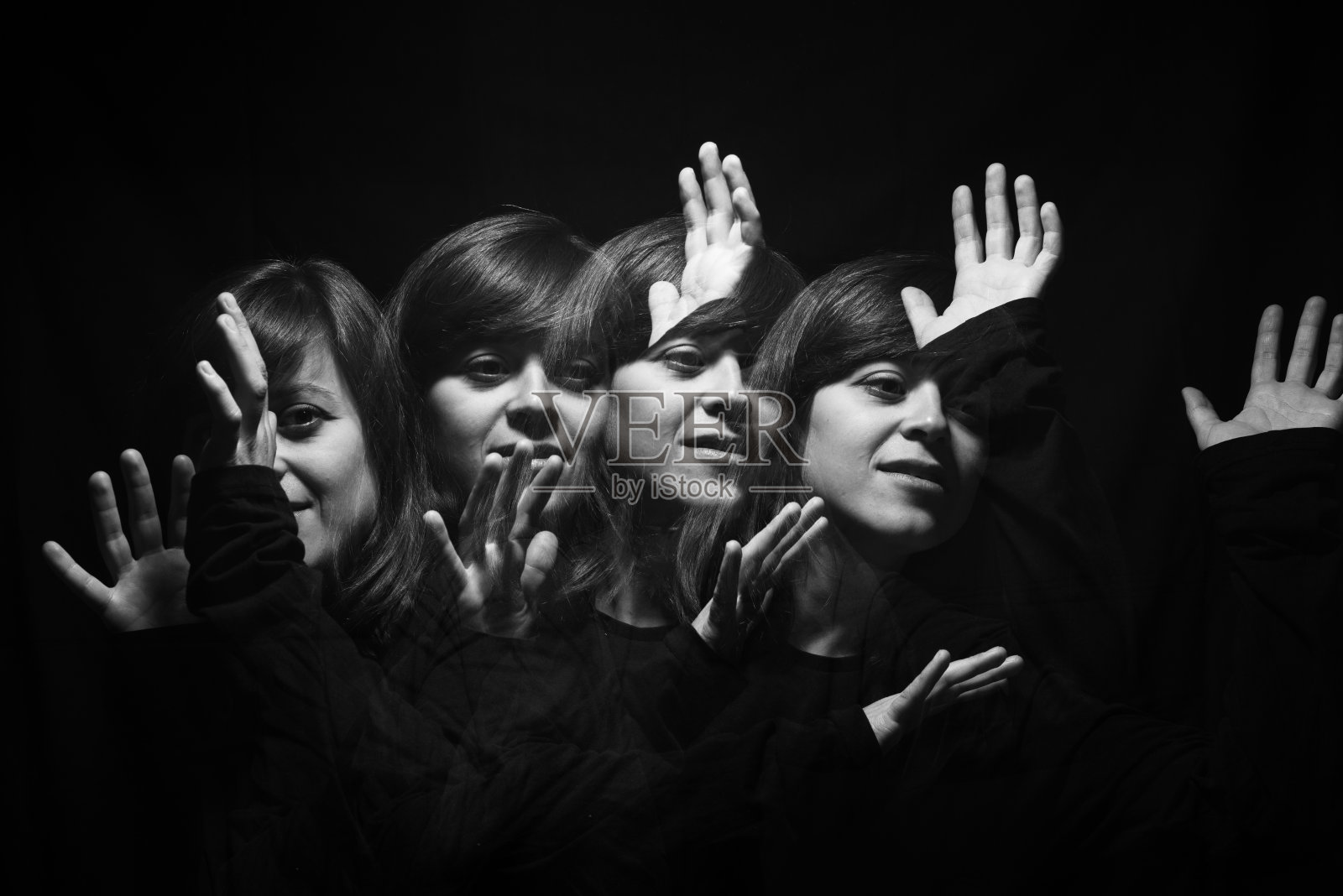 运动的光。一个年轻女子的肖像照片摄影图片