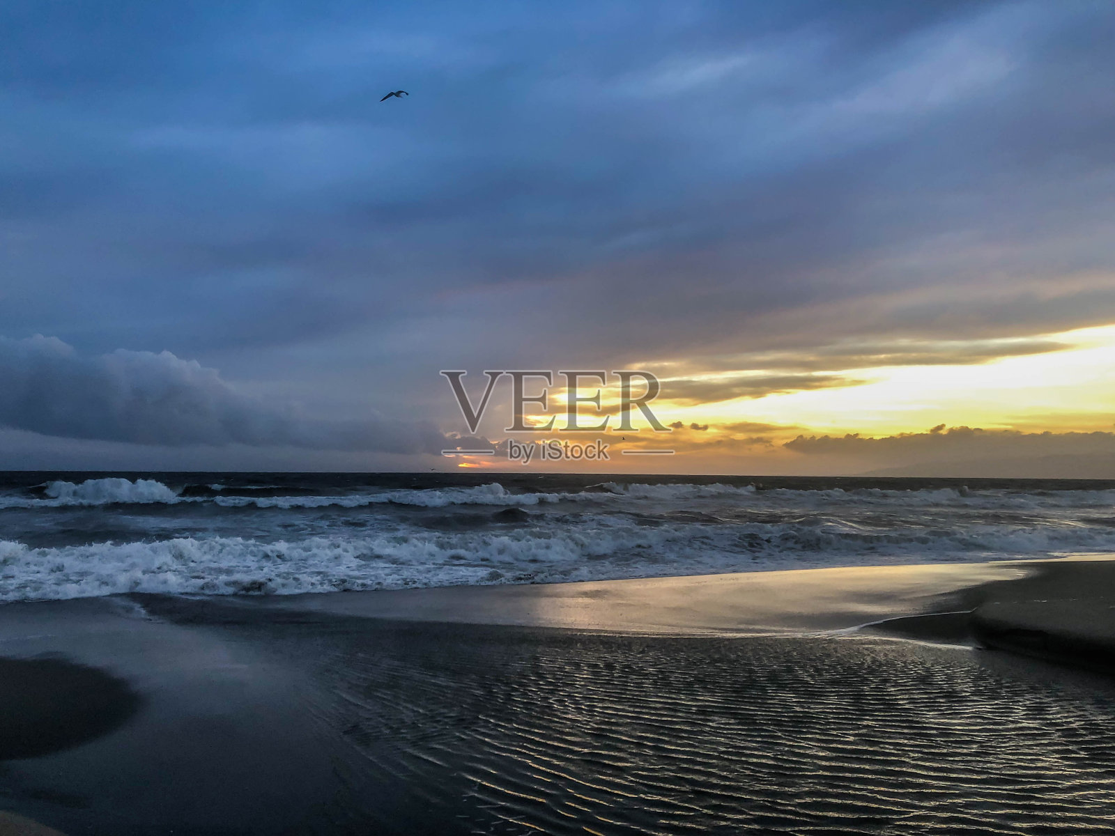 加州洛杉矶冬季太平洋上的日落照片摄影图片