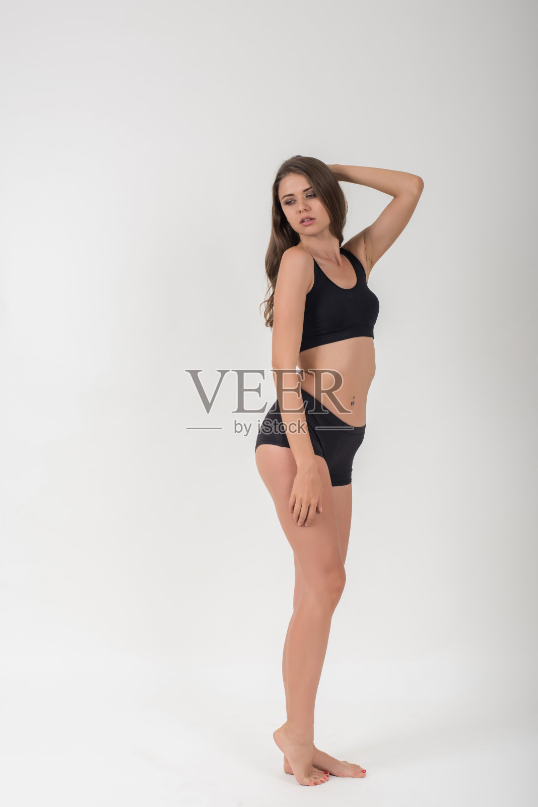 美丽的女人,健康的身体,白色的背景照片摄影图片