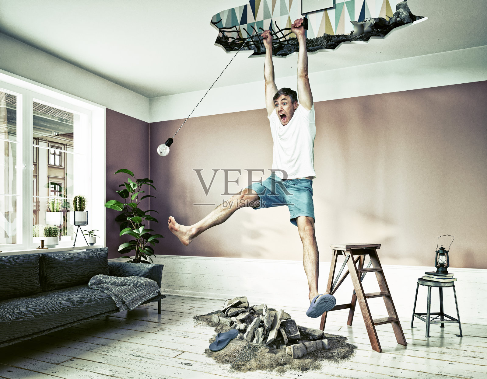 天花板坏了,还有一个人被吊在洞里。照片摄影图片