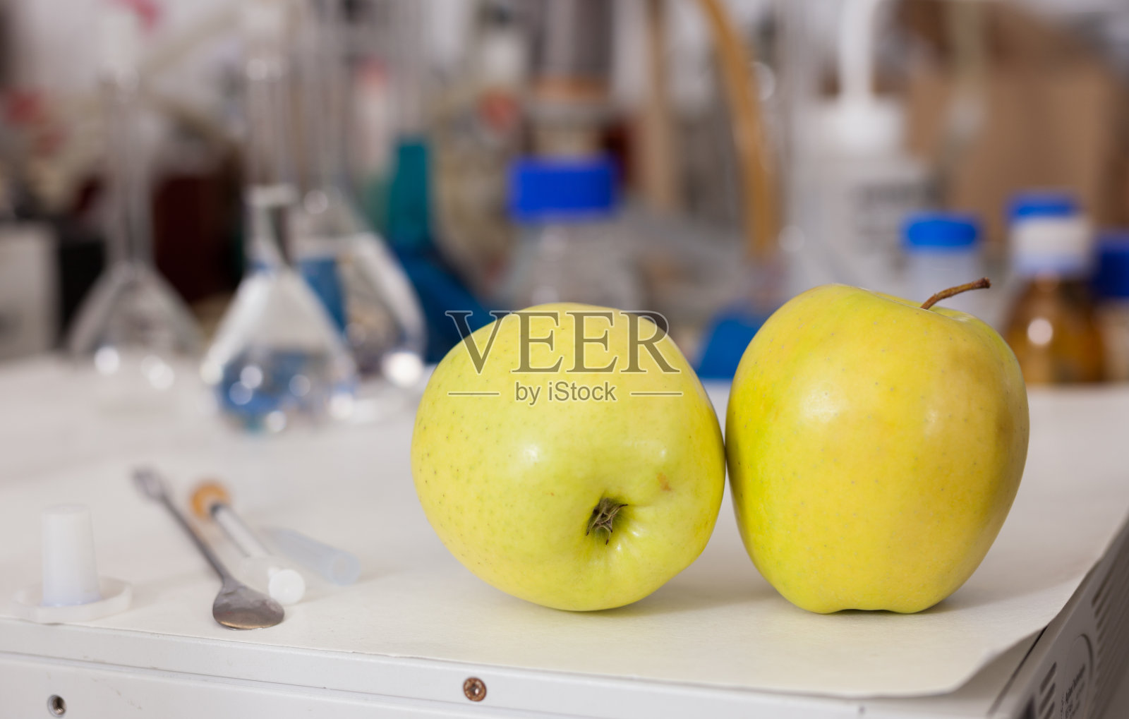 苹果与实验室工具的背景照片摄影图片