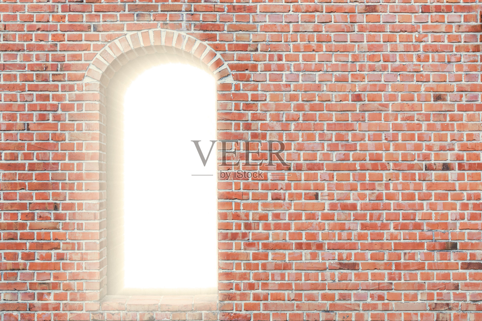 红色的砖墙闪烁着光芒。照片摄影图片