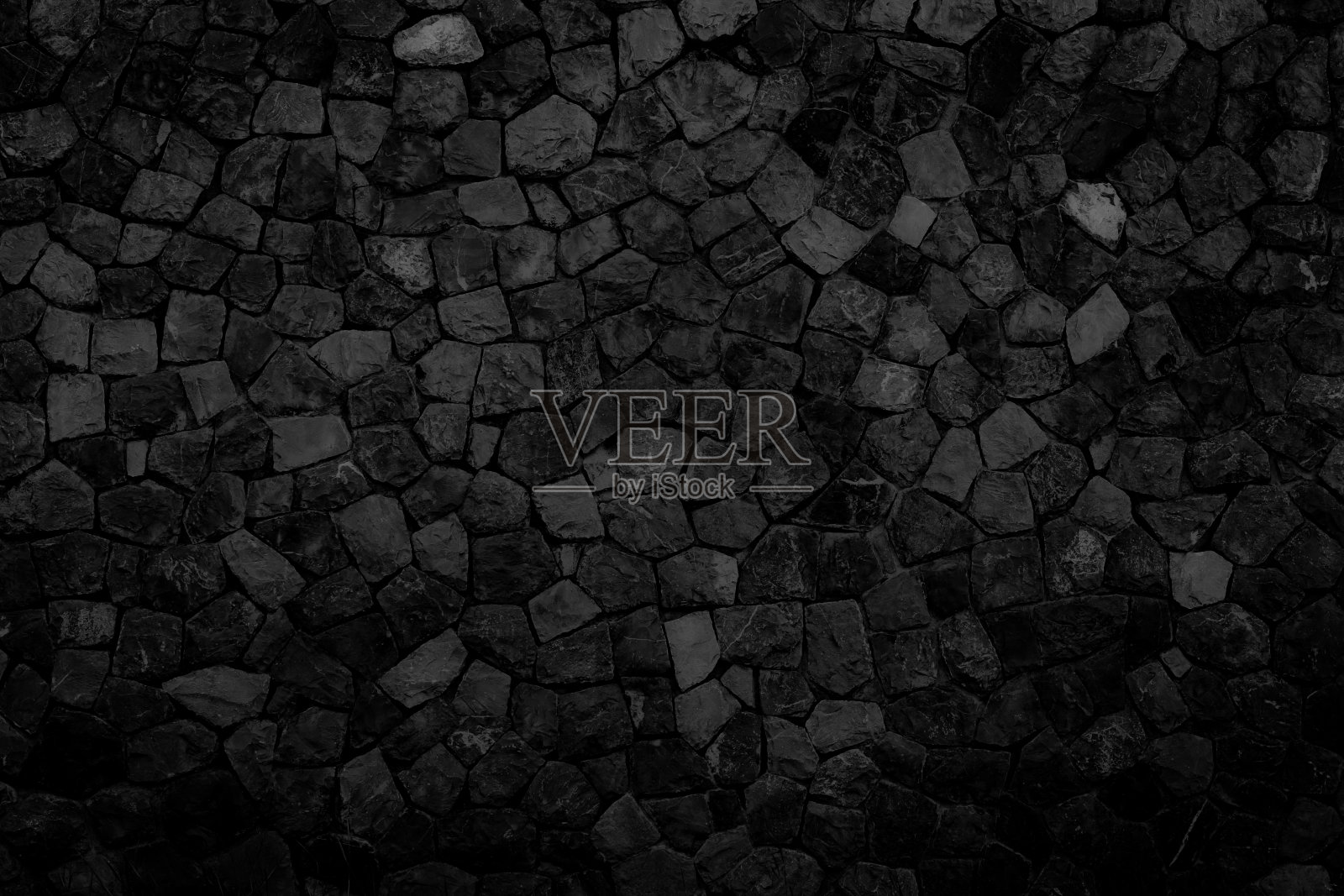 黑色石墙的纹理照片摄影图片