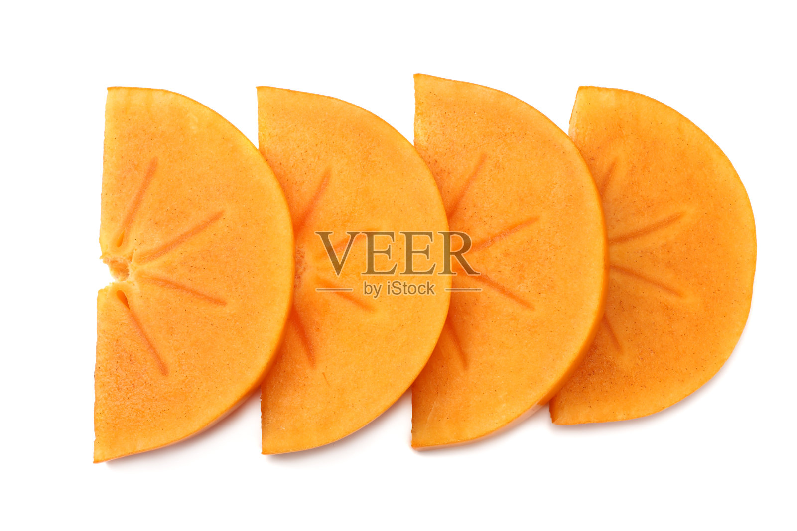 新鲜成熟的柿子片孤立在白色的背景。俯视图照片摄影图片