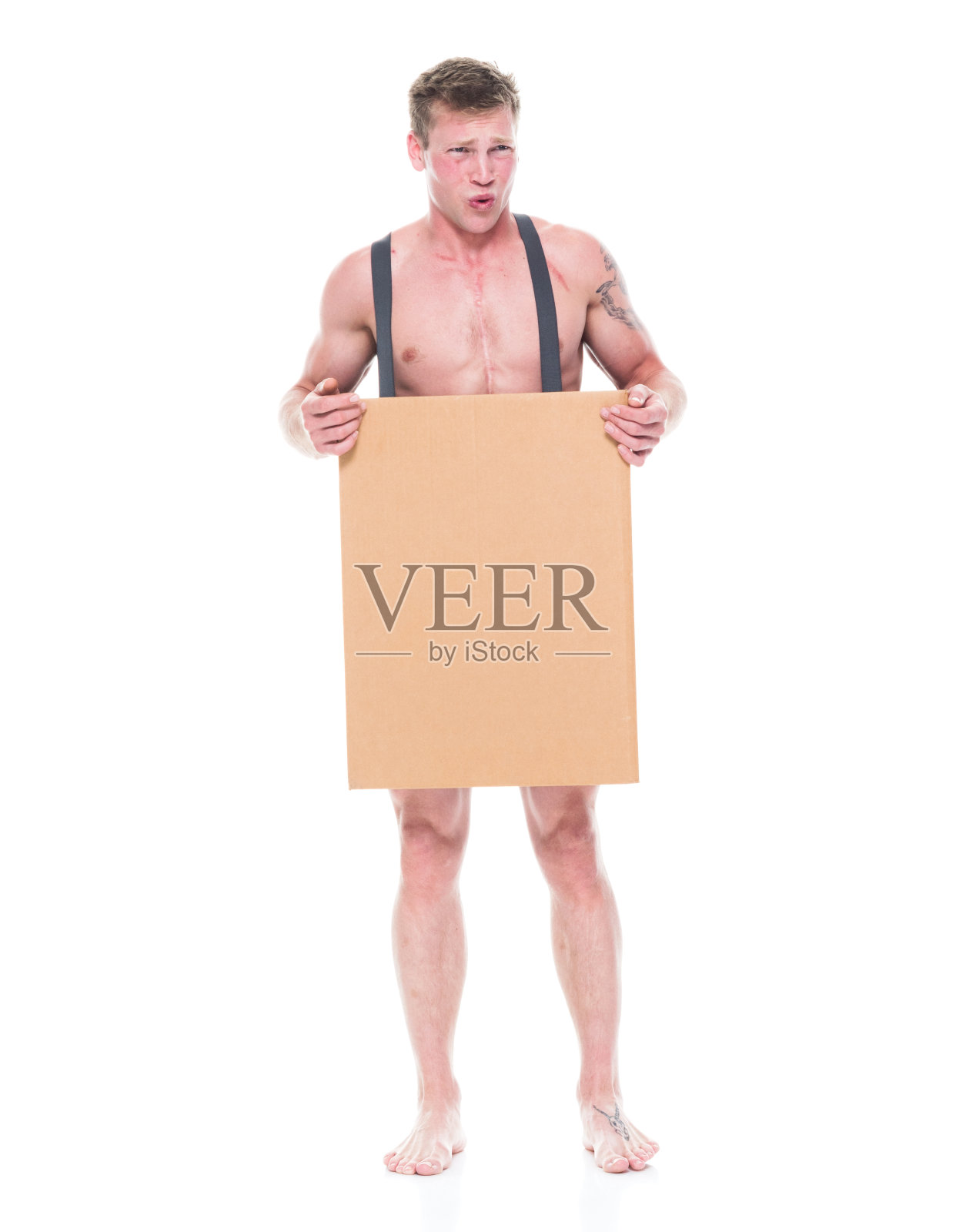 箱子里的穷人很困惑照片摄影图片