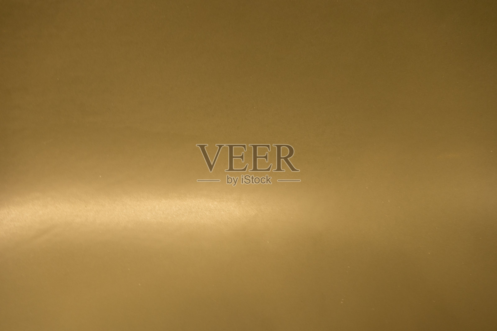 背景是棕色的。纹理石膏在饱和的颜色。创造性的背景。照片摄影图片