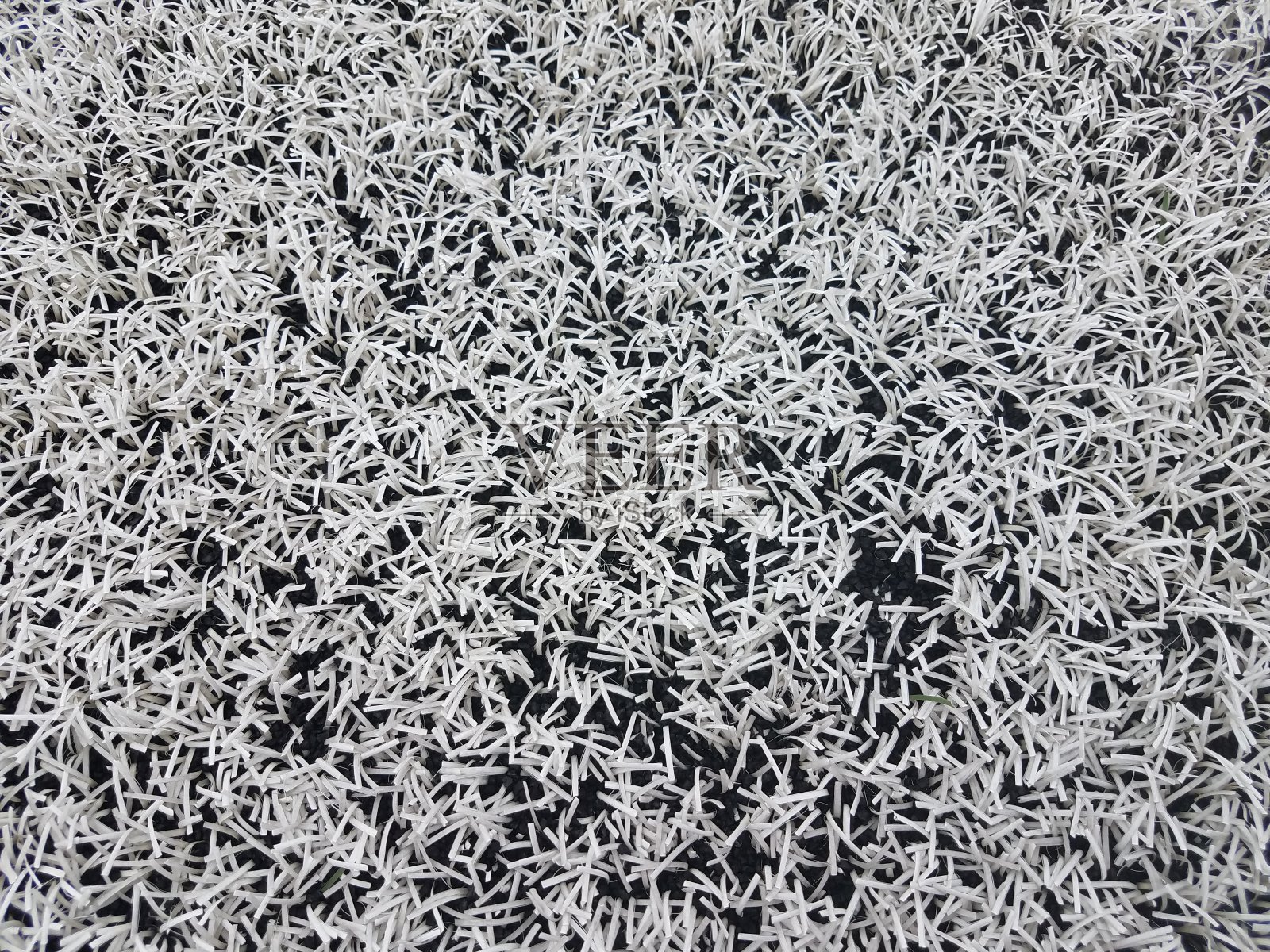 白色和黑色的人造草照片摄影图片
