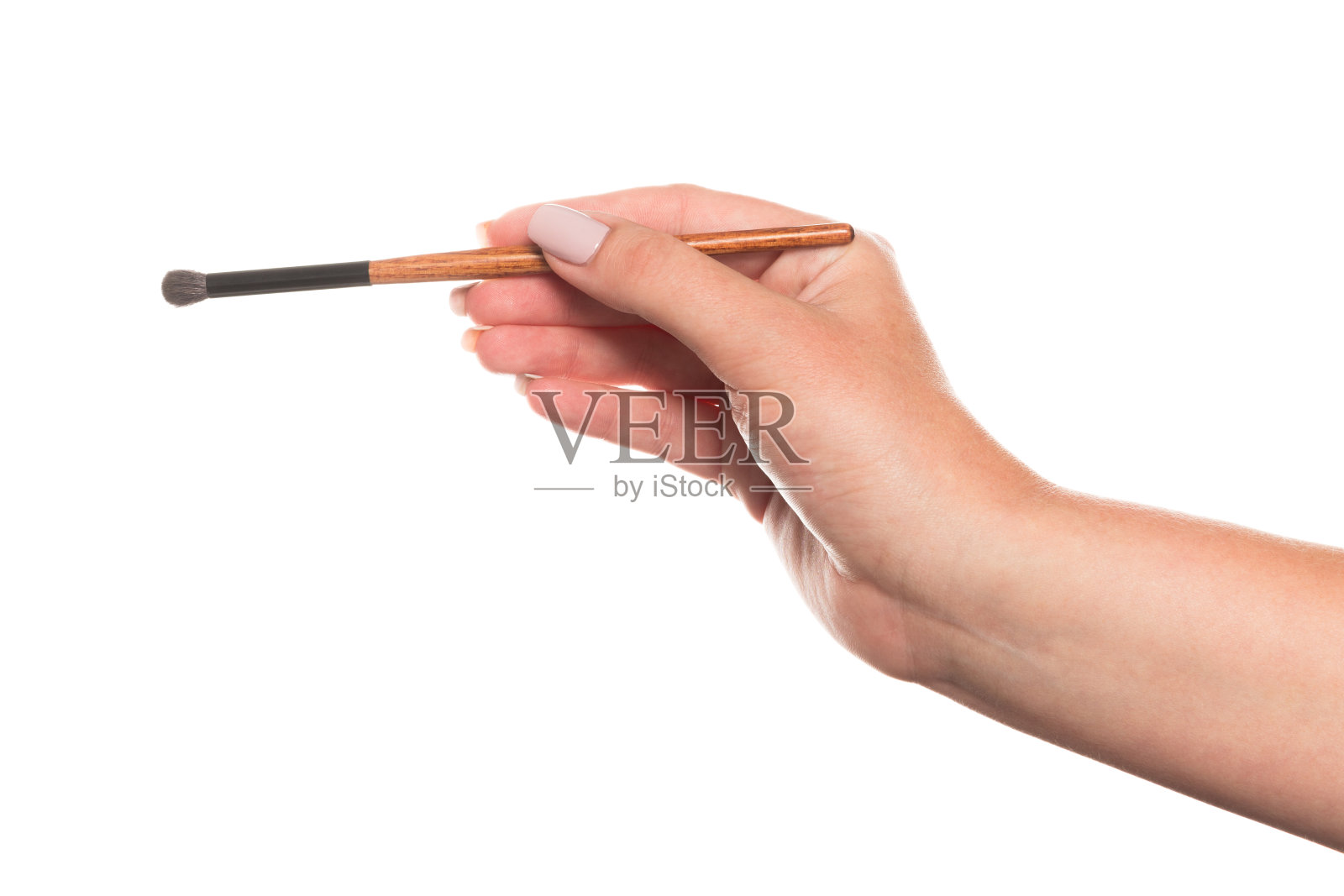 女用手用刷子为化妆孤立上白照片摄影图片