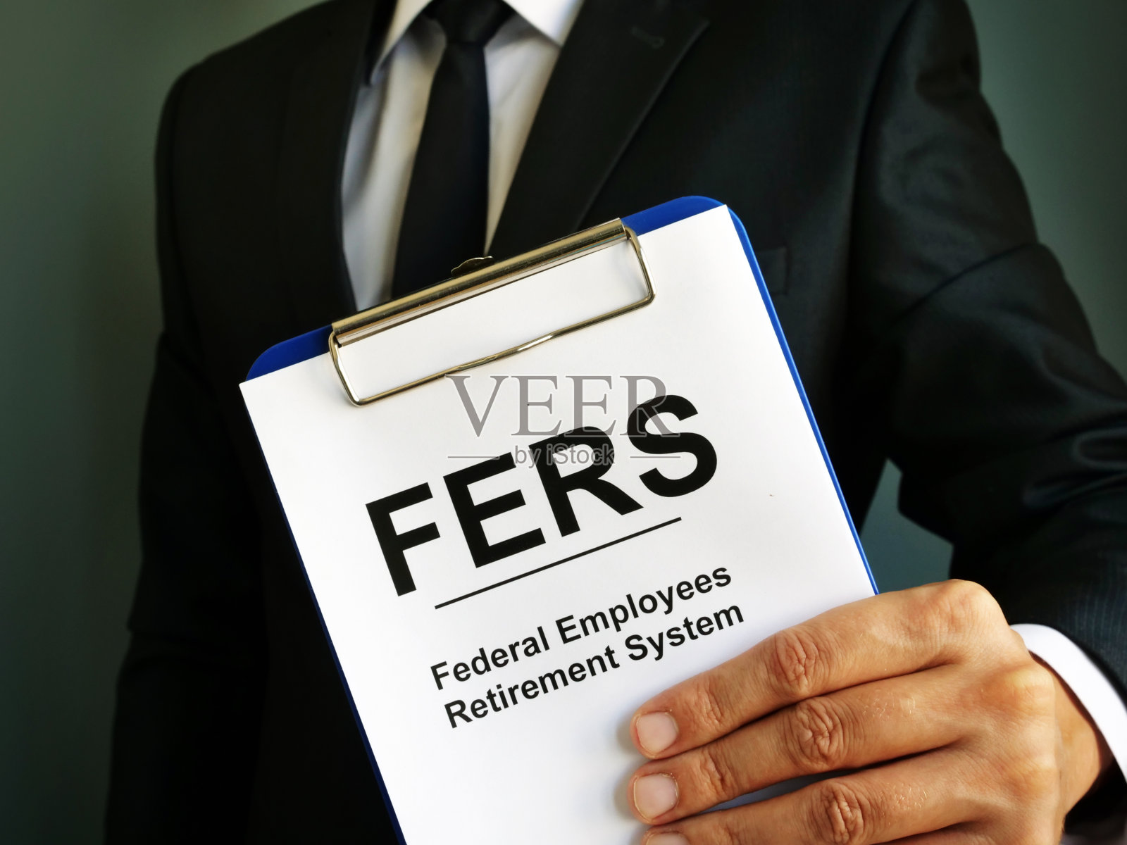 他持有联邦雇员退休系统(Federal Employees Retirement System)。照片摄影图片