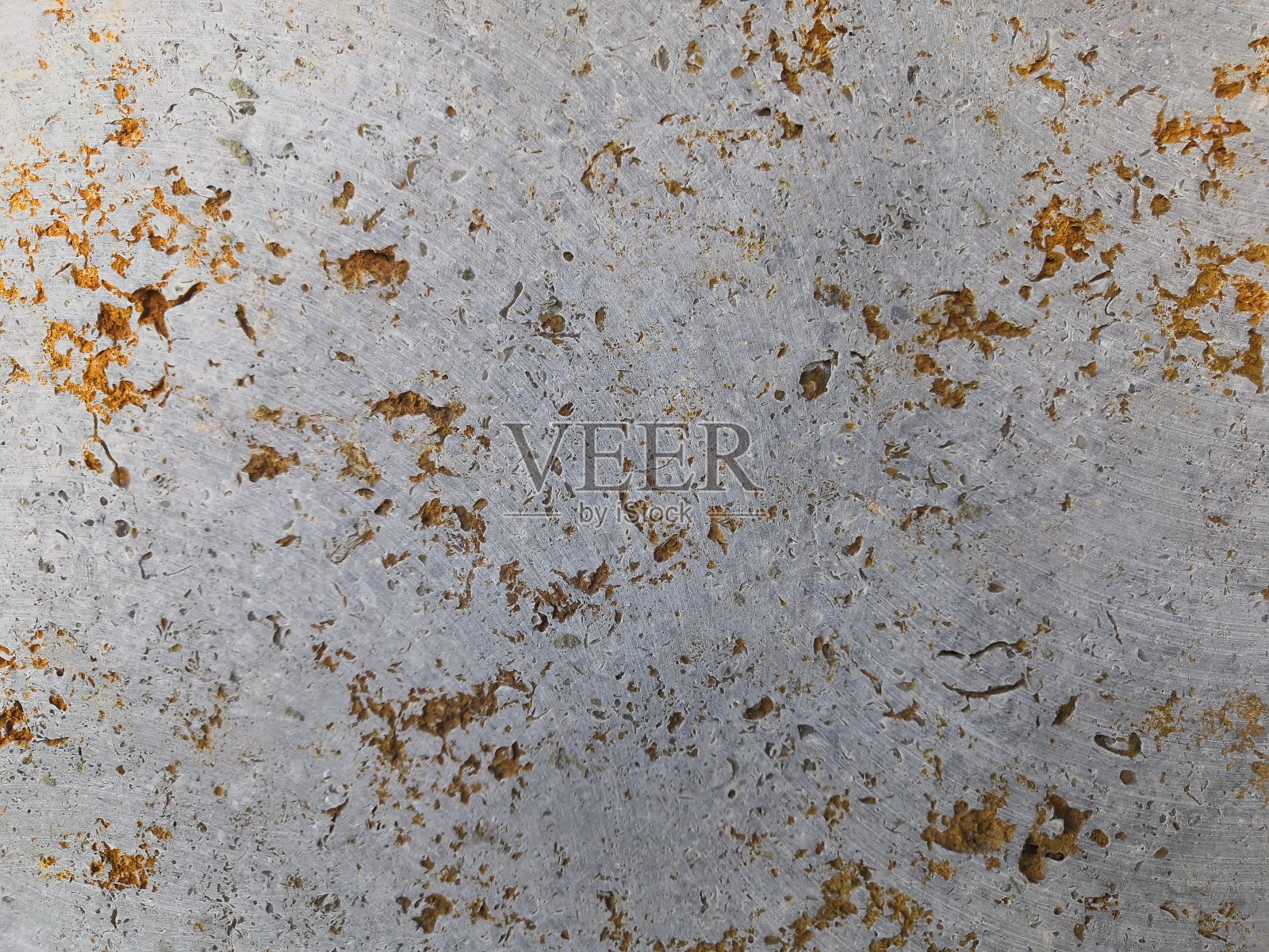 抽象的金色涂在灰泥混凝土墙的粗糙表面。金色纹理背景和壁纸照片摄影图片