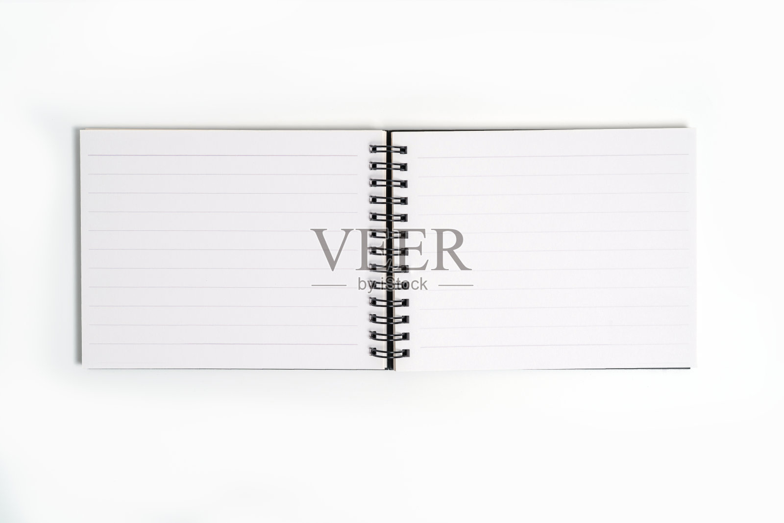 黑色笔记本上的白色背景与剪切路径照片摄影图片