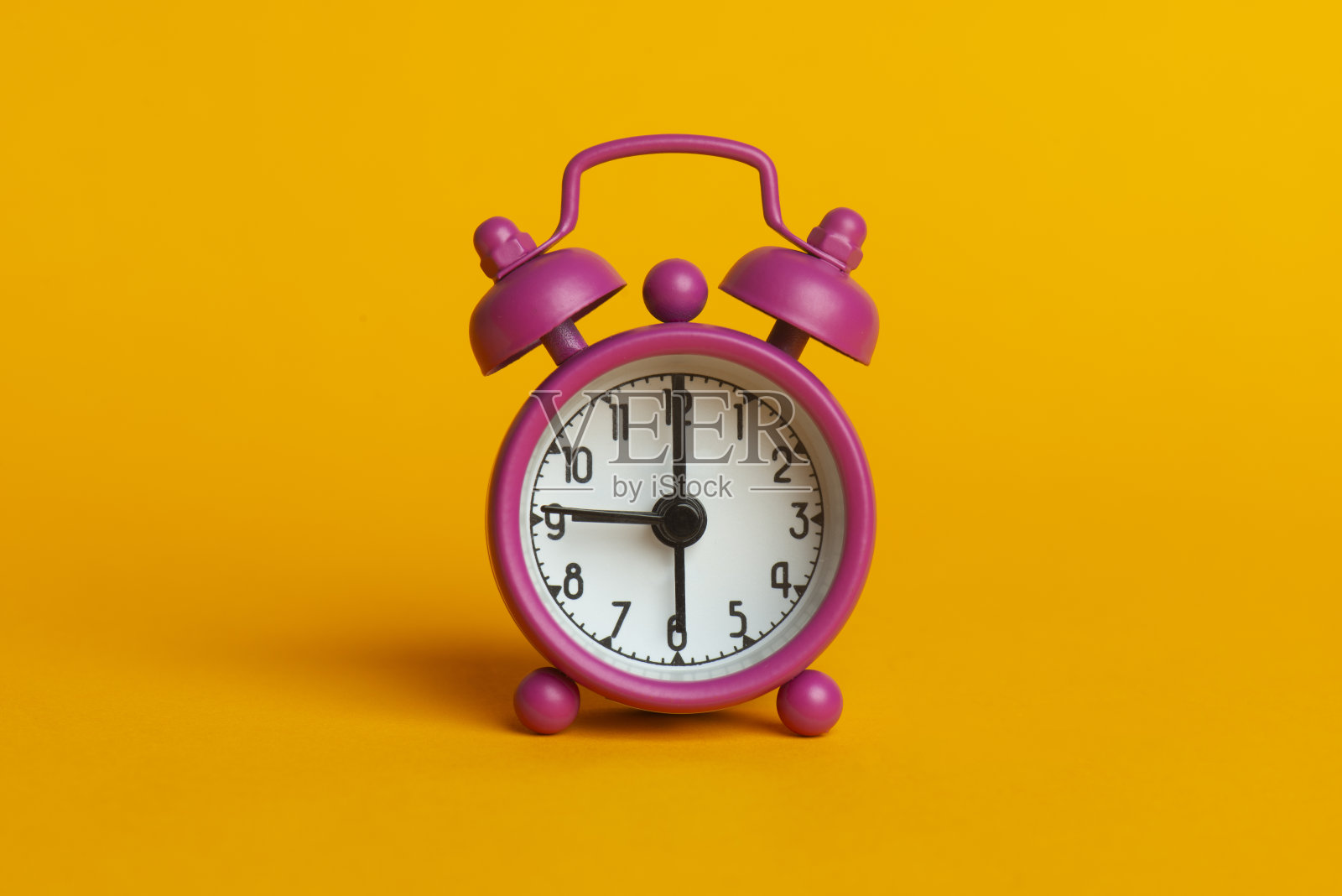 粉红色的闹钟照片摄影图片