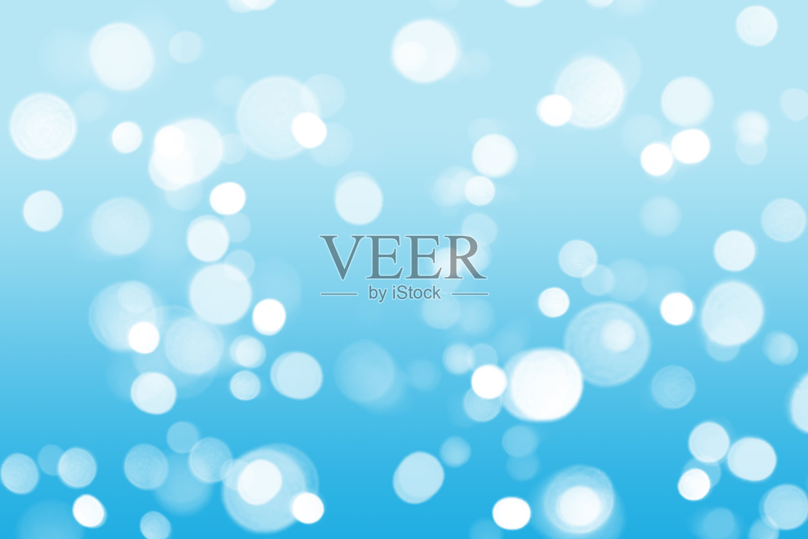 美丽柔和的蓝色抽象的散景灯光背景照片摄影图片