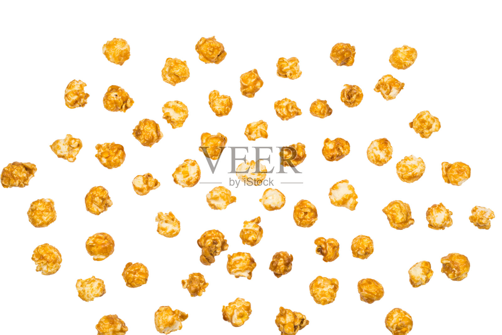 焦糖爆米花孤立在白色背景。照片摄影图片