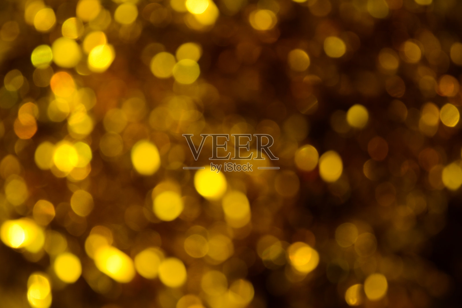 散景。节日的背景。圣诞灯。闪闪发光。散焦蓝宝石。新年的背景。节日的壁纸。眨眼。狂欢节。金属丝。散景复古风格照片。金。黄金。照片摄影图片