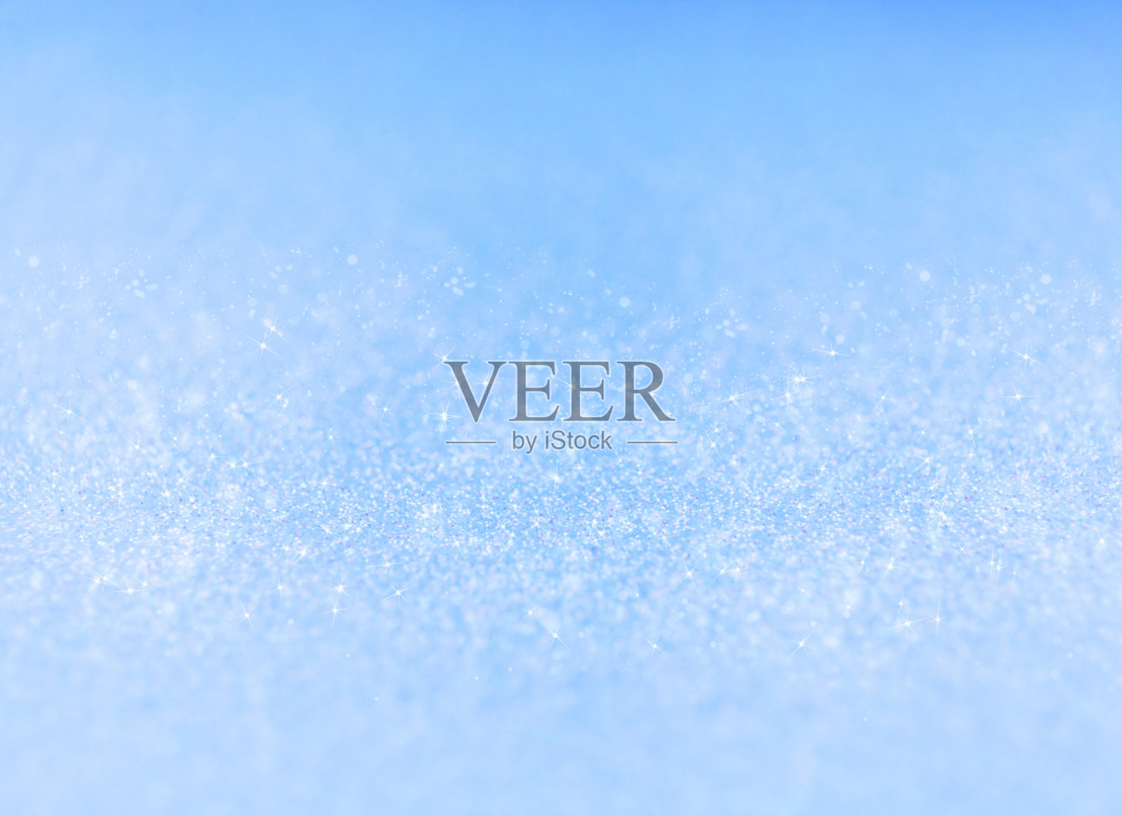 抽象闪烁耀眼的灯光背景。De-focused灯照片摄影图片