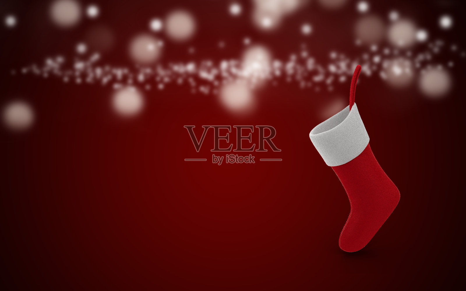 圣诞贺卡与圣诞袜在红色的背景照片摄影图片