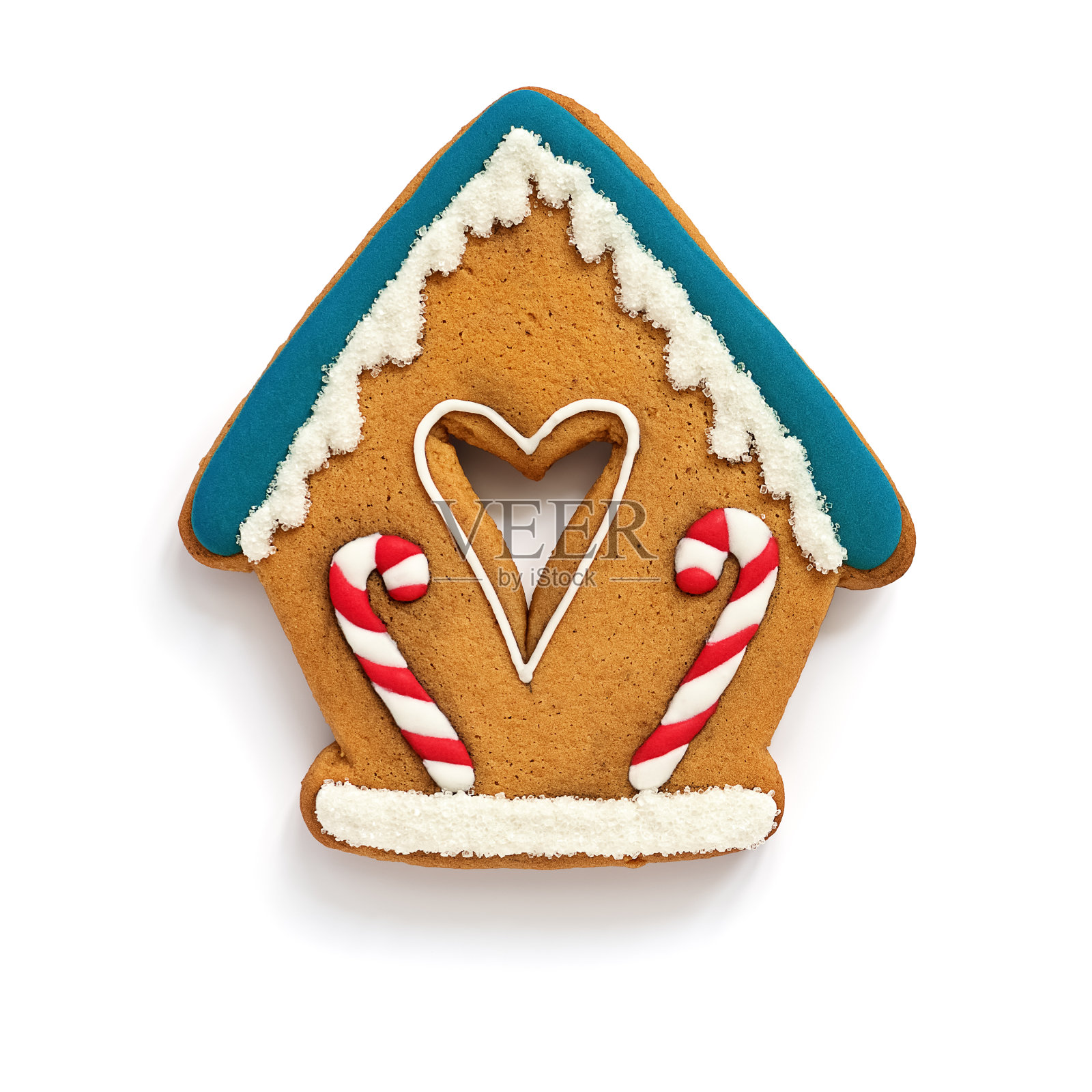 姜饼屋在一个白色的背景孤立。喜庆的圣诞烘烤。平的。照片摄影图片