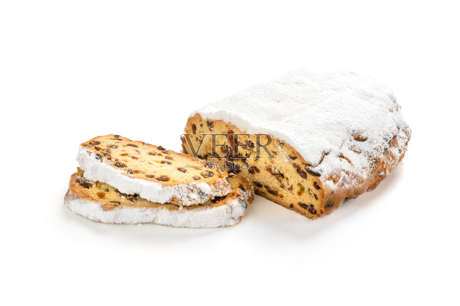 圣诞节Stollen孤立的白色背景。加葡萄干和糖霜的德国甜面包照片摄影图片