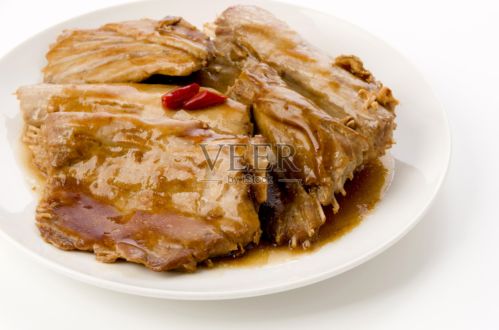 日本料理,煮金枪鱼的骨头部分照片摄影图片