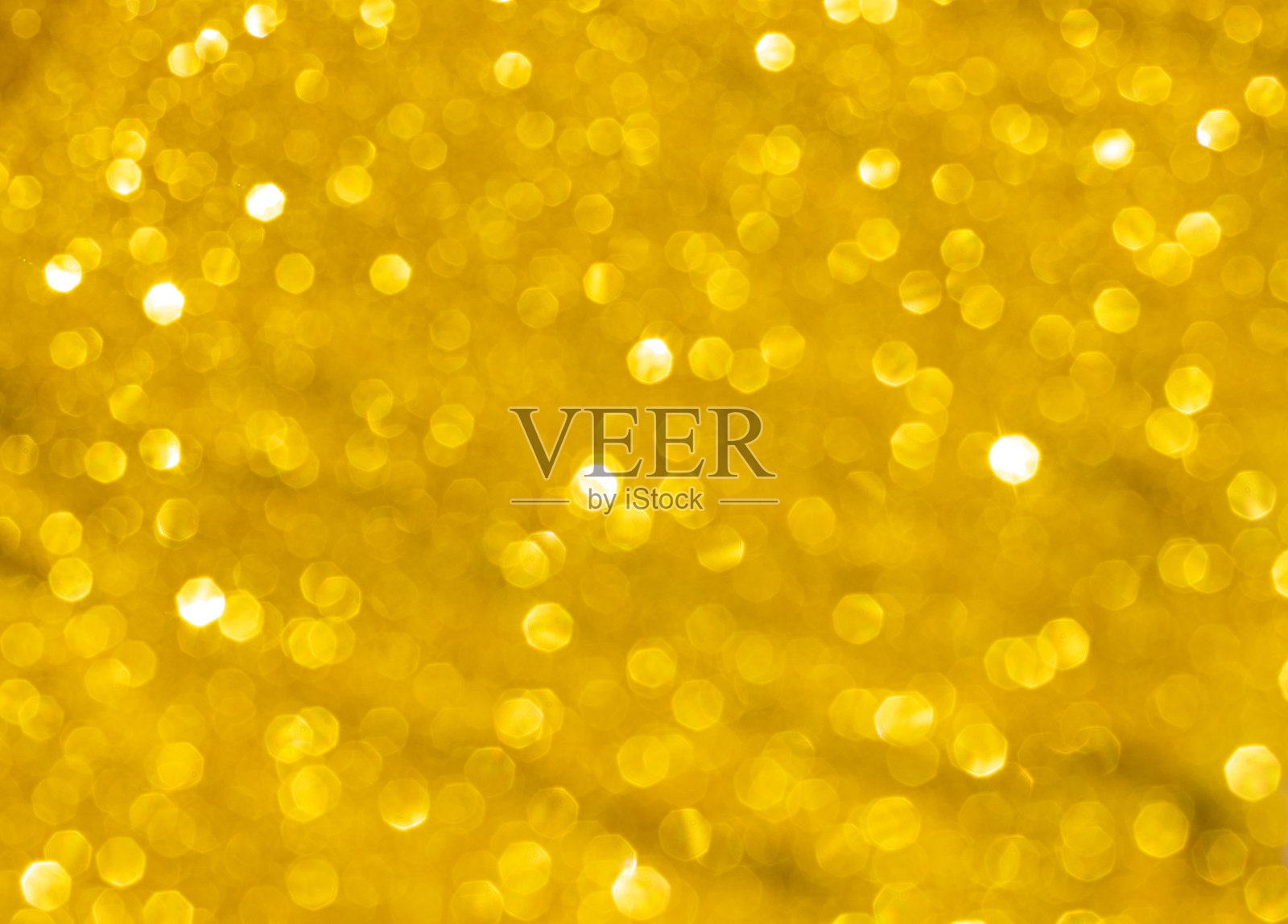 金色的背景。新年的背景。照片摄影图片