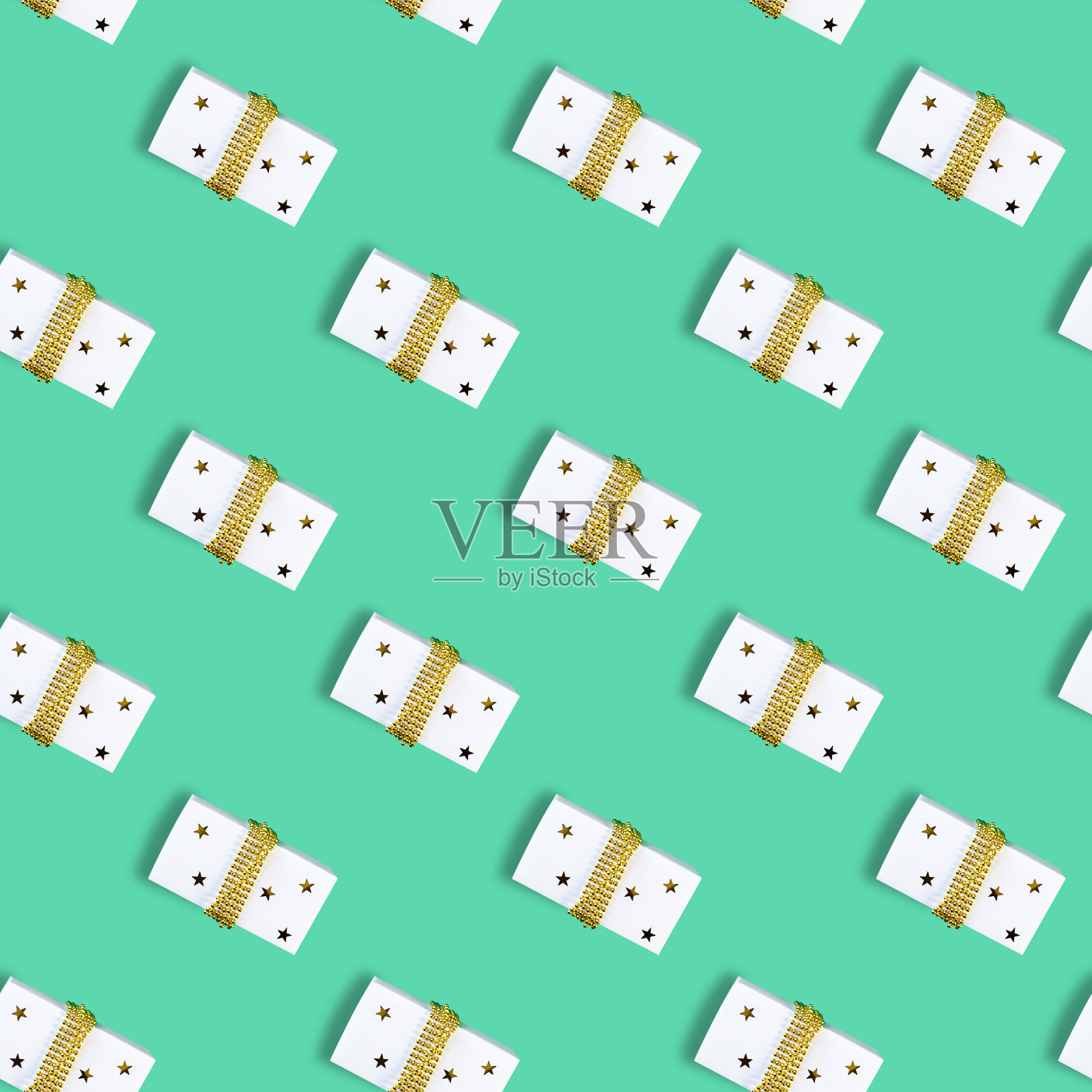 无缝圣诞图案与圣诞礼盒薄荷背景。平的。照片摄影图片