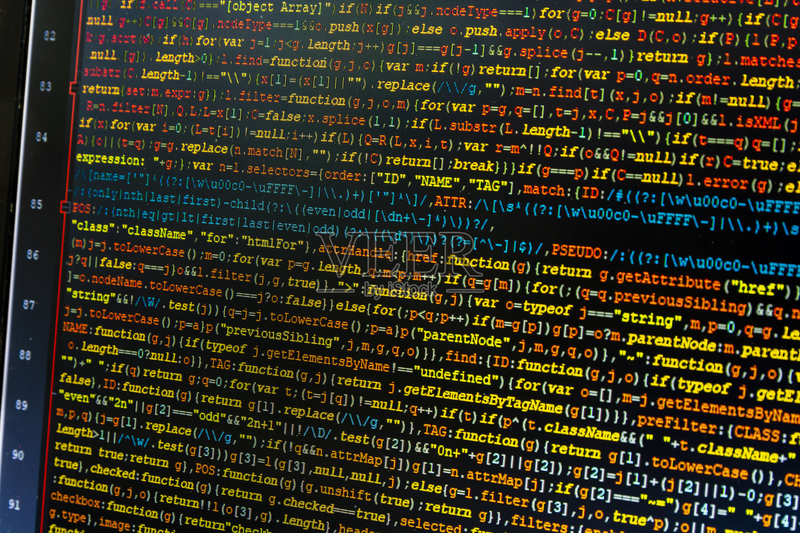 在监视器屏幕上关闭javascript (jquery)代码片段。代码语法颜色的编辑器在黑暗的背景。照片摄影图片