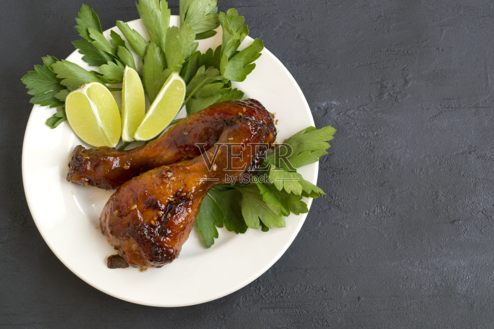 芝麻糖醋炸鸡腿照片摄影图片