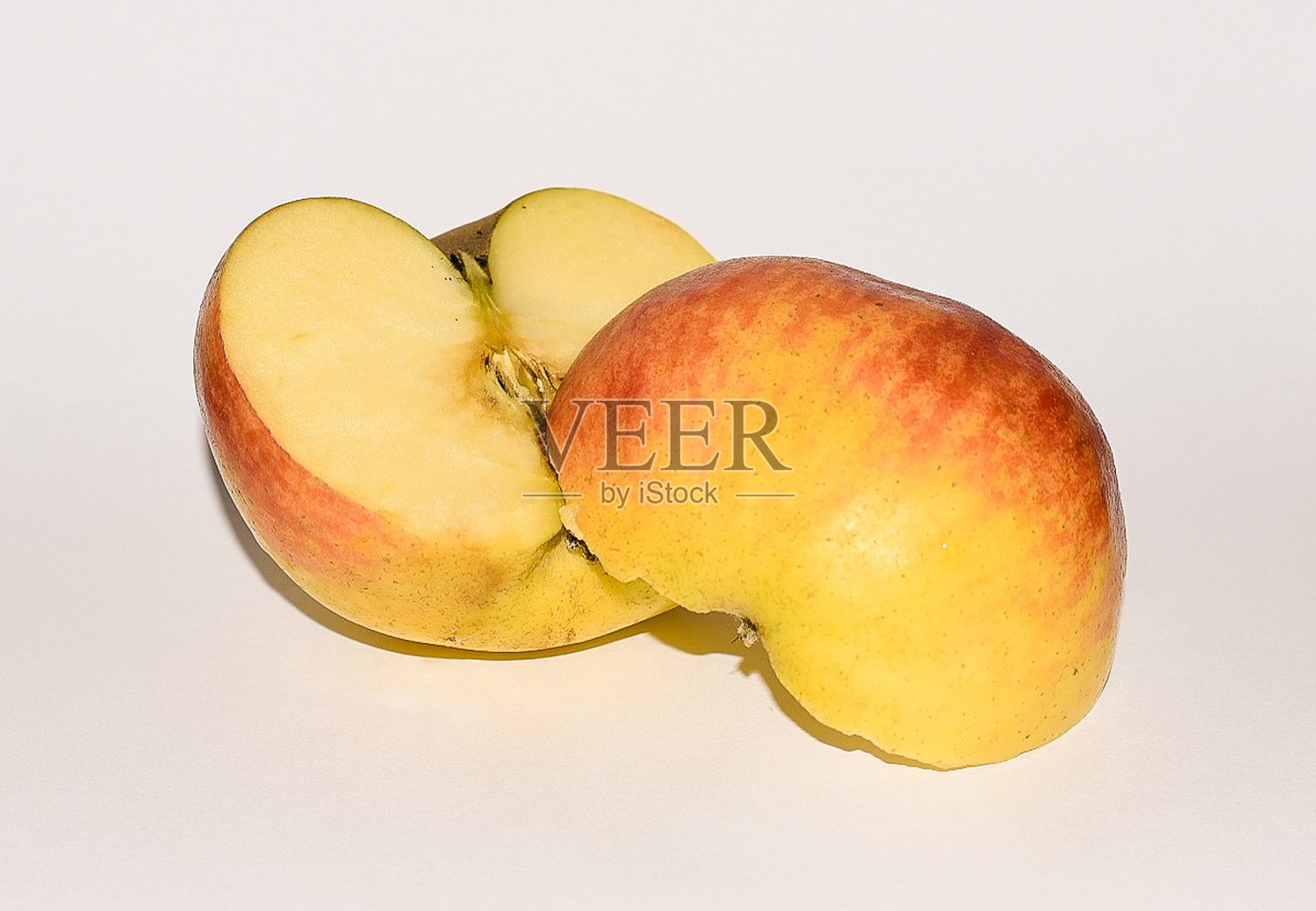 苹果切innhalf照片摄影图片