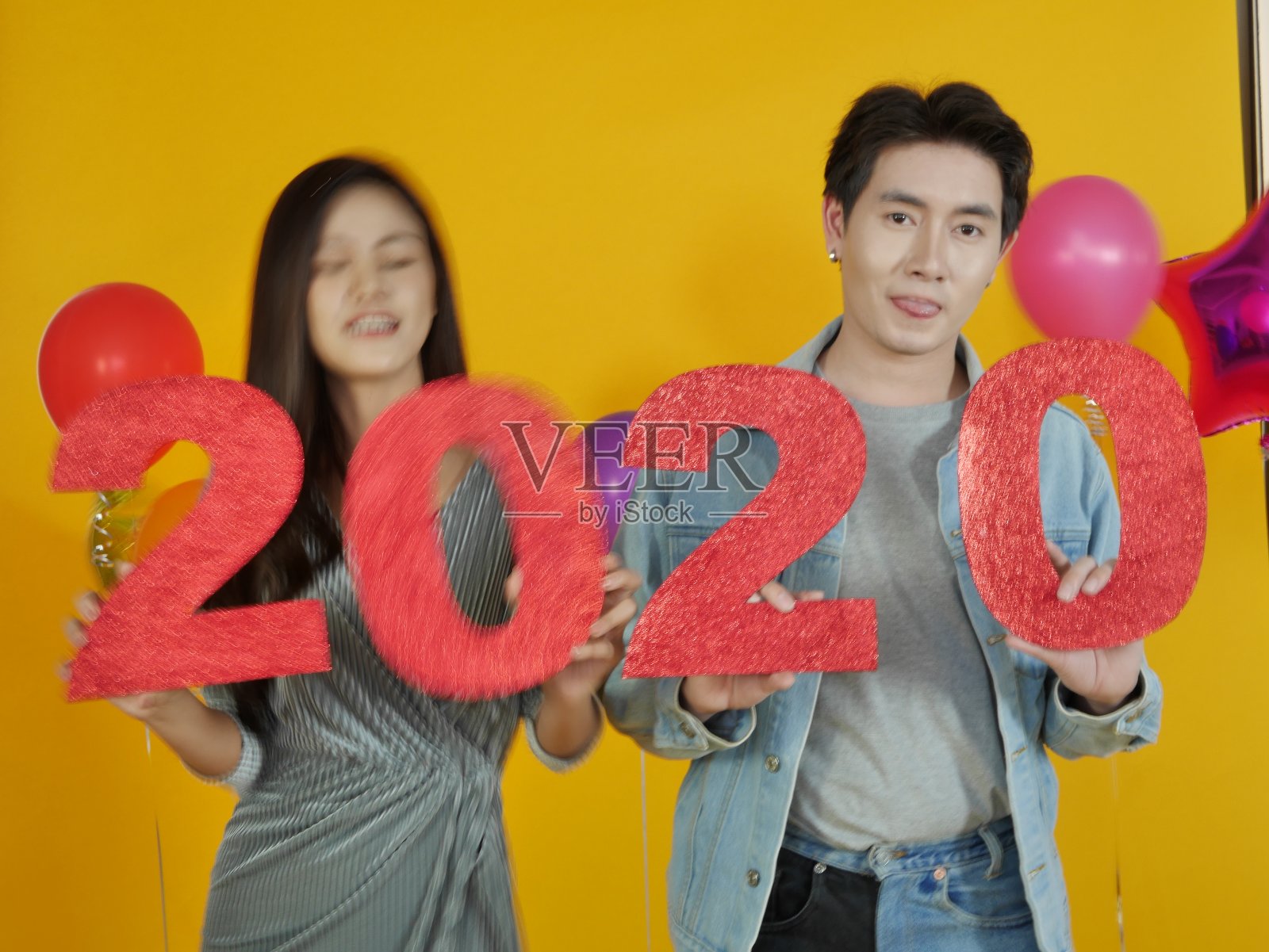 夫妇男女假日派对新年和圣诞2020照片摄影图片