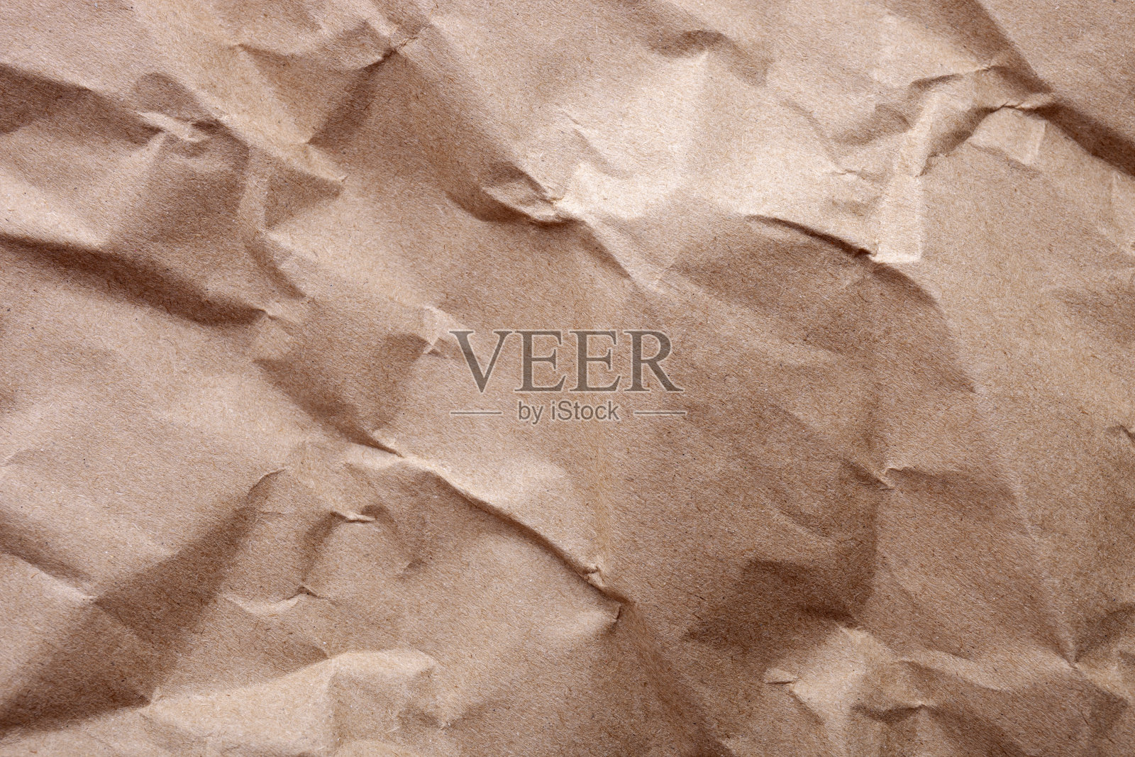 皱褶的牛皮纸纹理作为背景与地方的文本照片摄影图片