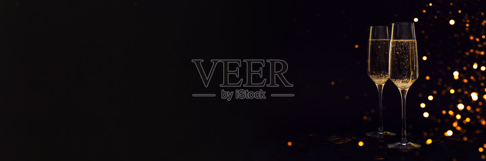 黑色背景上有香槟杯的横幅照片摄影图片