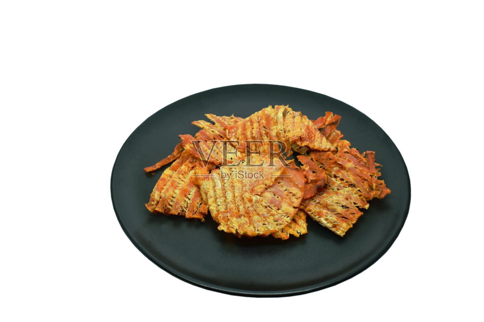 粉碎烤鱿鱼的传统泰国小吃盘照片摄影图片