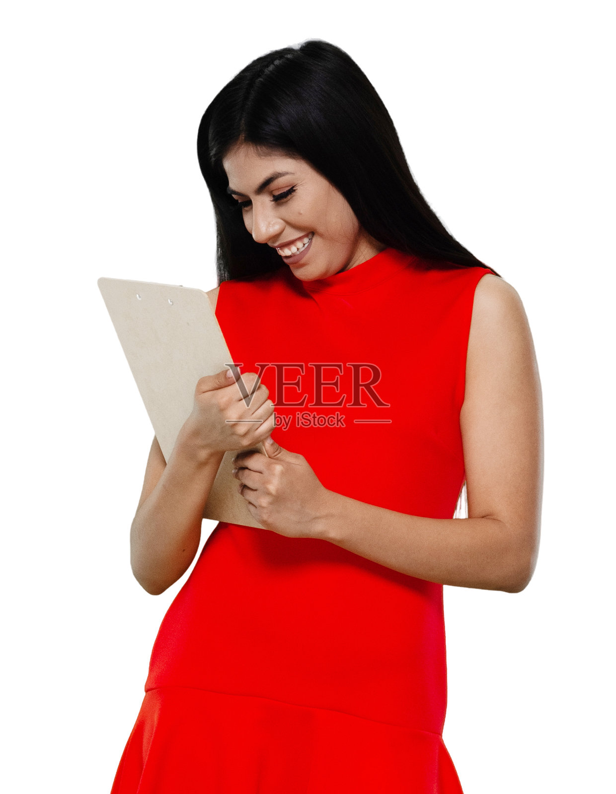 拉丁美洲和西班牙裔女性站在前面的白色背景穿着裙子,并持有做清单照片摄影图片